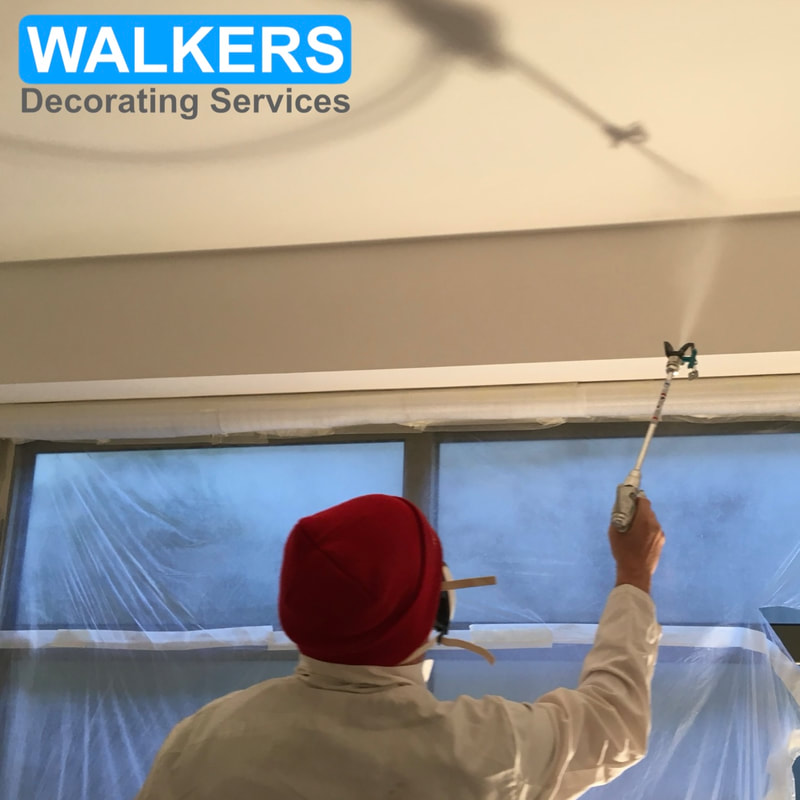 Spray application to a ceiling